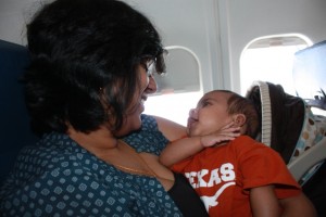 Aaron enjoying a chat with Amma on the flight